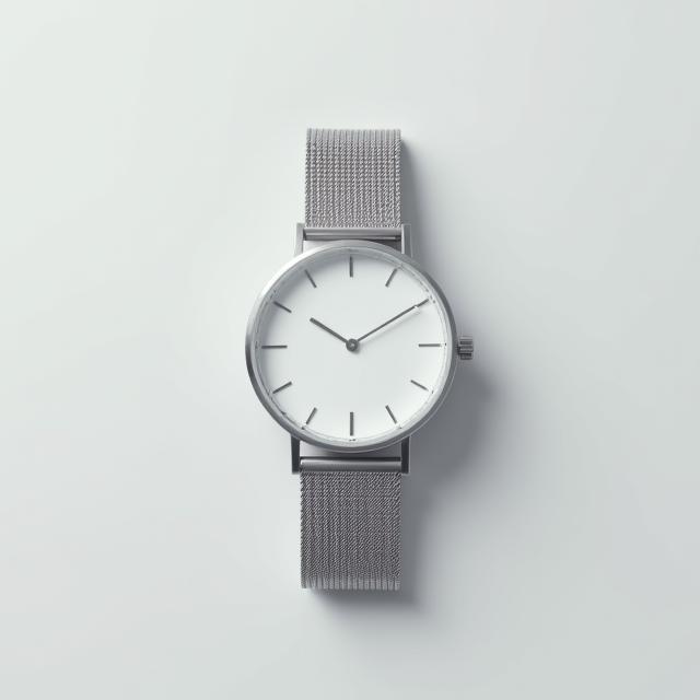 Minimalist silver watch with mesh bracelet